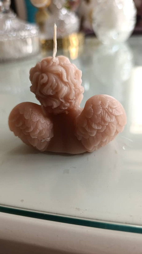 شمع فرشته مدل متفکر